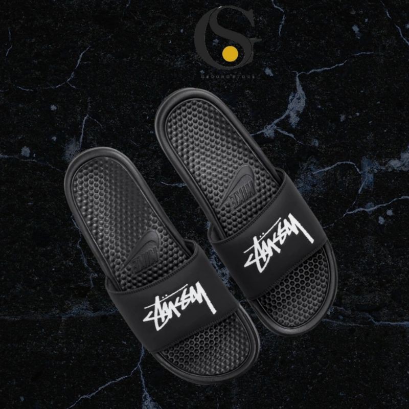 benassi swoosh slides