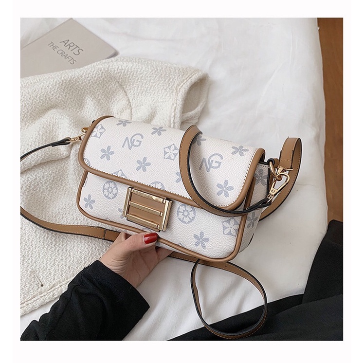 SG1972 Syafniegalery sling bag import motif NG star murah