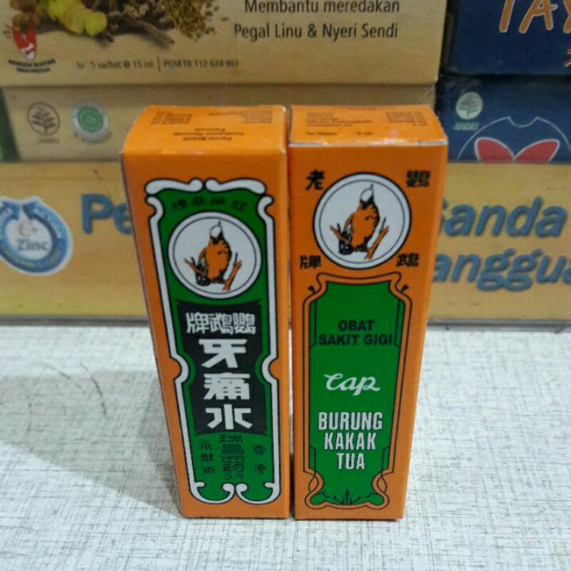 obat sakit gigi cap burung kakak tua ( minyak cengkeh )