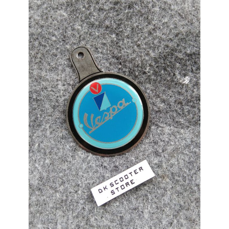 Vespa emblem tax holder