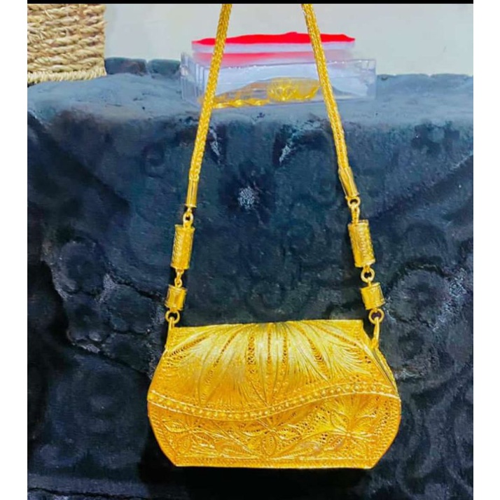 tas Kendari lapis emas