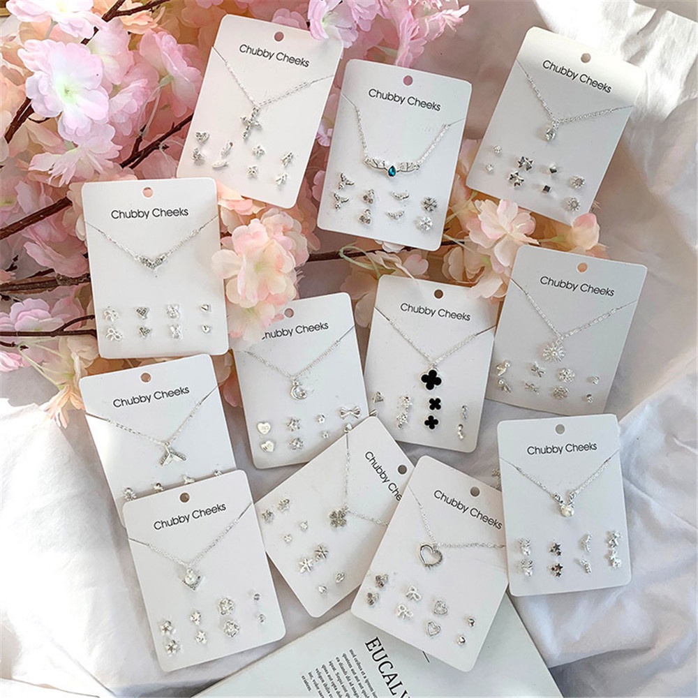 Set Anting Kalung Rantai Klavikula Bentuk Hati Bunga Empat Daun Aksen Mutiara Gaya Korea