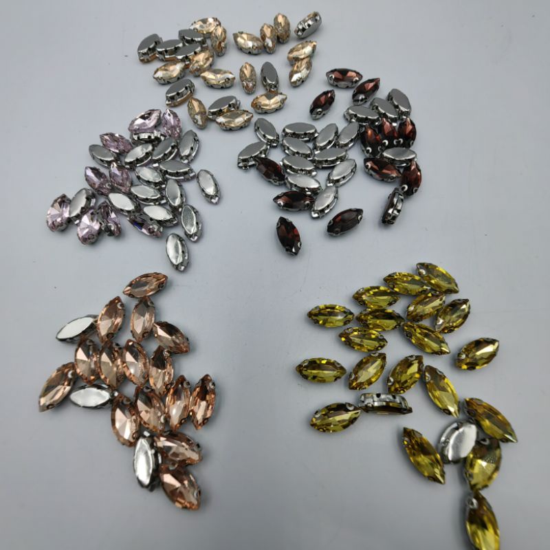 STONE KRISTAL CANGKANG / CANGKRANG MOTIF MATA / SAMPAN  UKURAN 7 X 15 MM PER BUTIR KUALITAS BAGUS KILAU