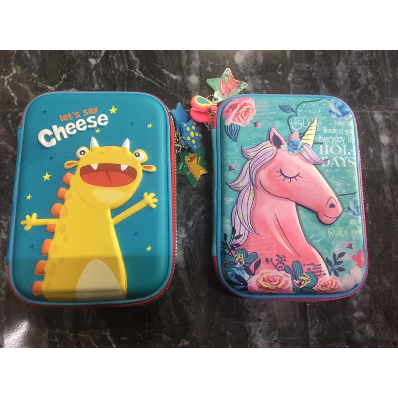 

TEMPAT PENSIL ANAK MODEL SMIGGLE