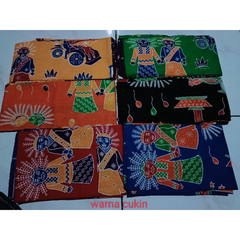 Kain sarung betawi dan cukin (syal) motif ondel - ondel