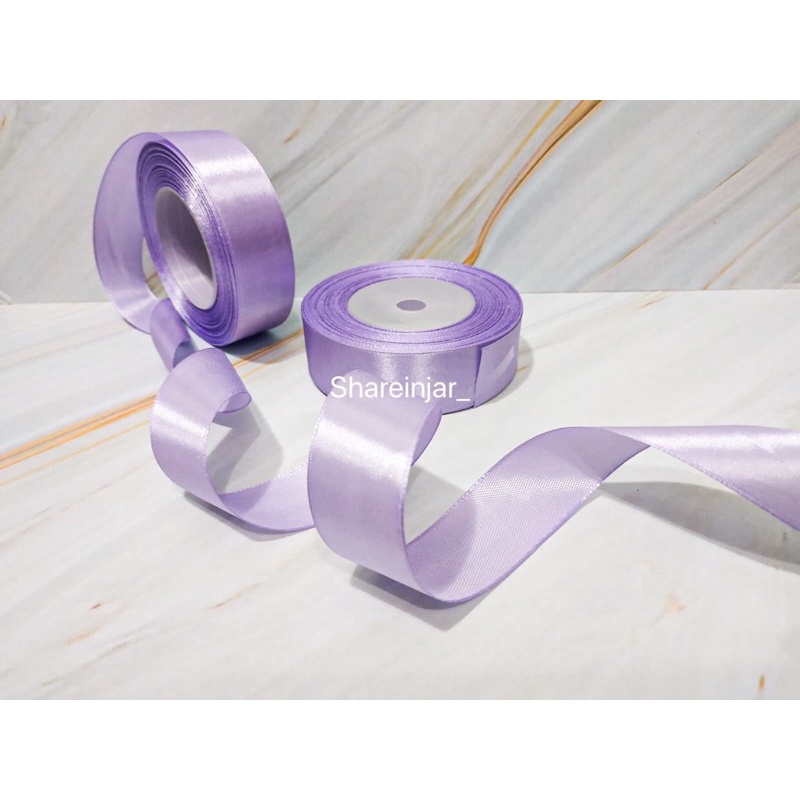 

Pita Satin Ungu Muda 1’(2,5cm) Per Roll Hiasan Box Kotak Hampers Kado