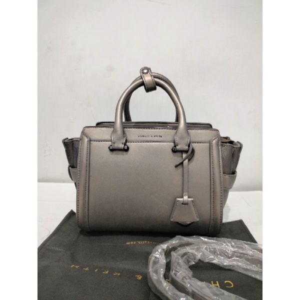 Preloved Ch*rles Keiith ck cnk top handle / hand bag silver