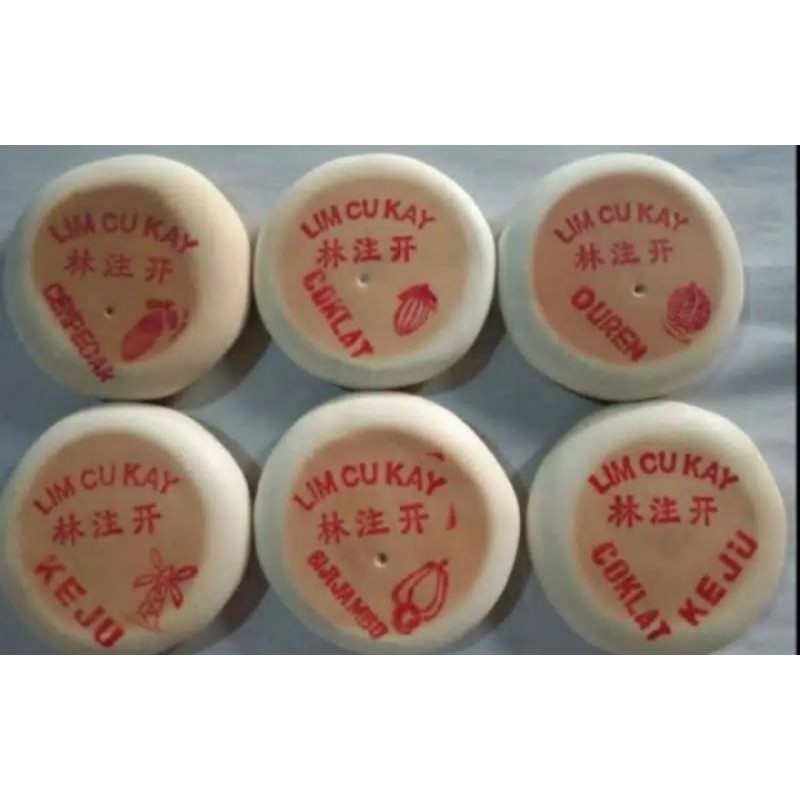 kue bulan " lim cu kay " . moon cake