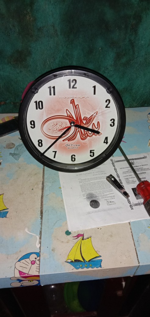 Jam Dinding / Jam Meja Ontime 1917 - K Kaligrafi Diameter 19 Cm Best Seller