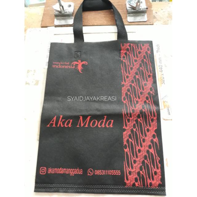 

Goodie Bag Press Tali Uk.30x40x10 cm sablon 2 warna 1 sisi