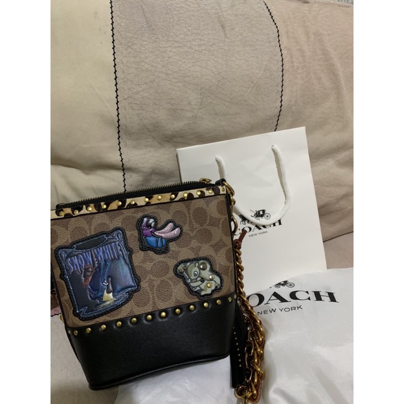 (preloved) coach disney x coach duffle 12 in signature patchwork (snow white)