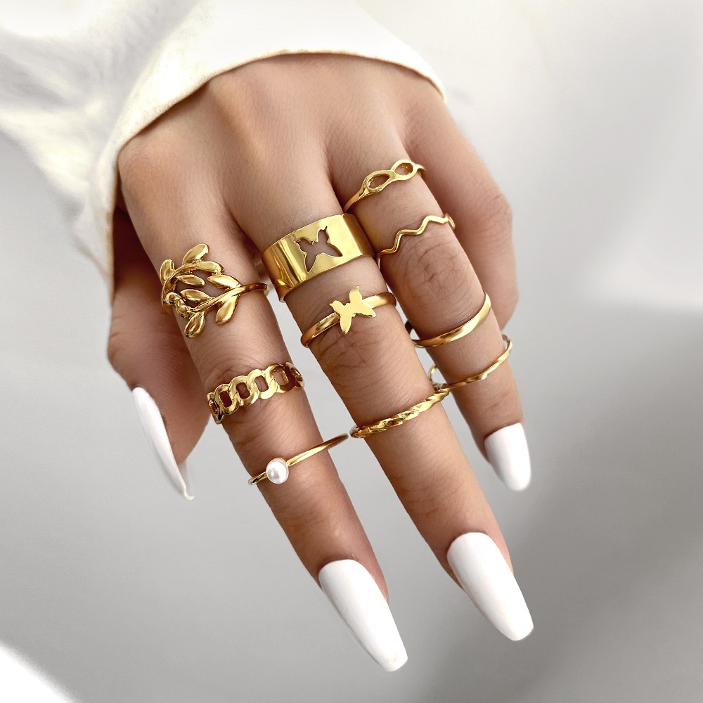 10pcs / Set Cincin Model Kupu-Kupu Hollow Warna Emas Aksen Mutiara Gaya Vintage Untuk Wanita