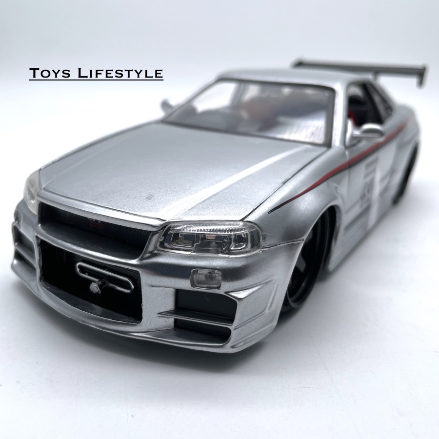 Mobil Jada Diecast JDM Tuners 2002 Nissan Skyline GT-R (R34) 1:24