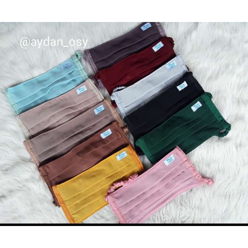 

masker diamon puring kaos 2 ply Lusinan isi 12pcs (label kheyar)
