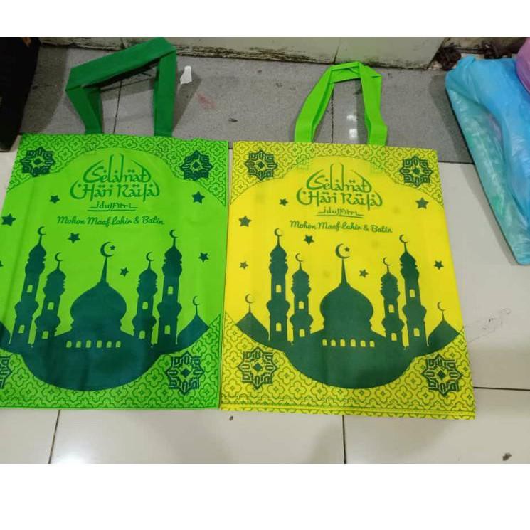 

☚ tas kain spunbond lebaran/goodie bag lebaran isi 12 pcs (38*45)promo tas lebaran&idul Fitri ♔