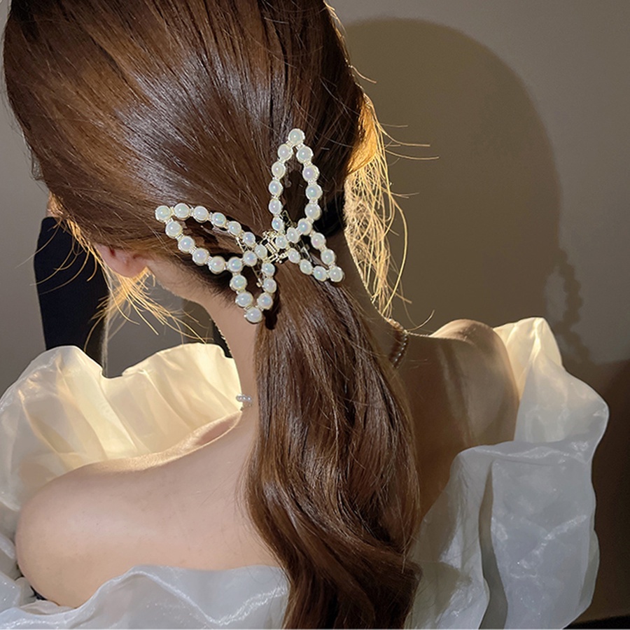 Jepit Rambut Model Butterfly Hollow Aksen Mutiara Bahan Alloy Gaya Korea Untuk Wanita