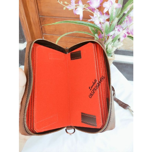 Dompet Taji / Rimpi