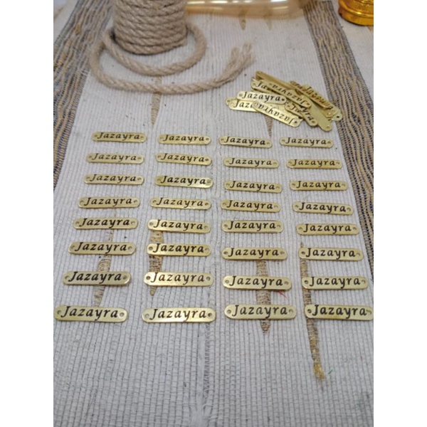 label hijab plat Kuningan merk baju custom baju Koko abaya anti karat murah