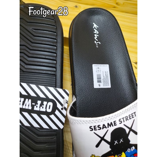 SANDAL SLIDE KAWS SUPREME SESAME / SANDAL SELOP KAWS GRADE ORI