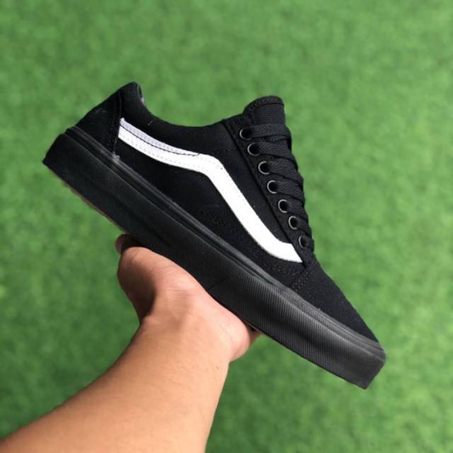 white and black stripe vans