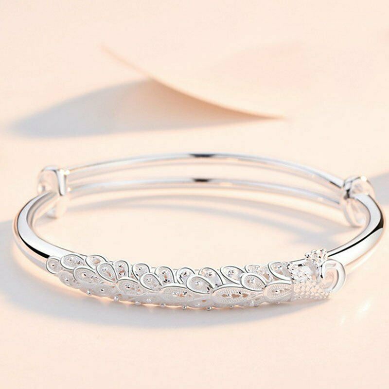 Gelang Bangle Adjustable Desain Bulu Burung Merak Warna Silver Untuk Wanita