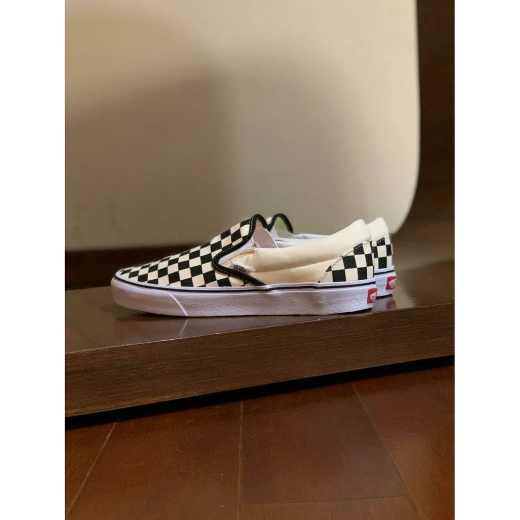 vans checkerboard slip on harga