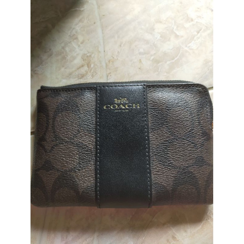 Preloved coach wristlet in signature canvas - brown black