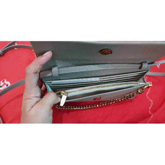 Original charles & keith. Dompet sekaligus tas. Tali panjang bisa di lepas.