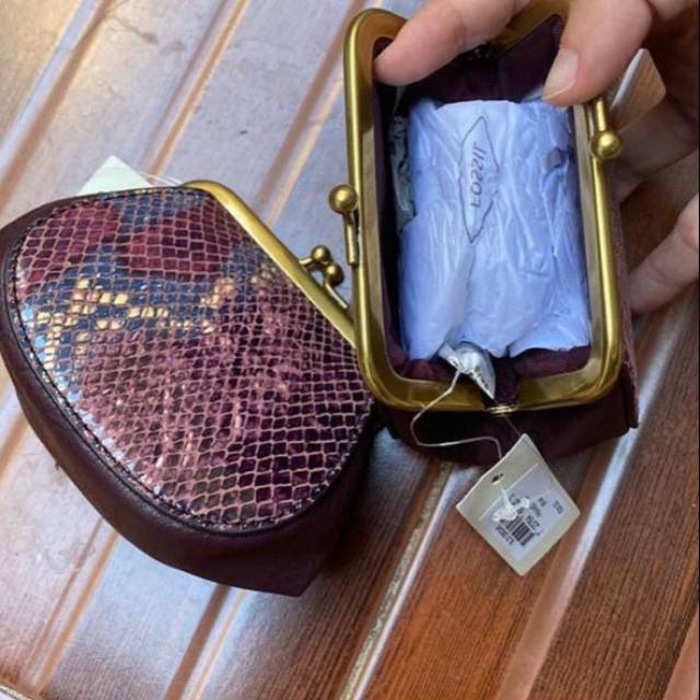 Dompet koin fossil