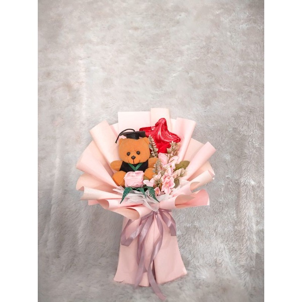 

Buket wisuda/boneka