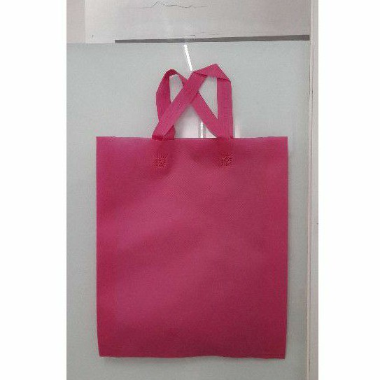 

Tas Press Spunbound Tali Goodie Bag Tas Belanja Warna Pink 38 cm x 45 cm