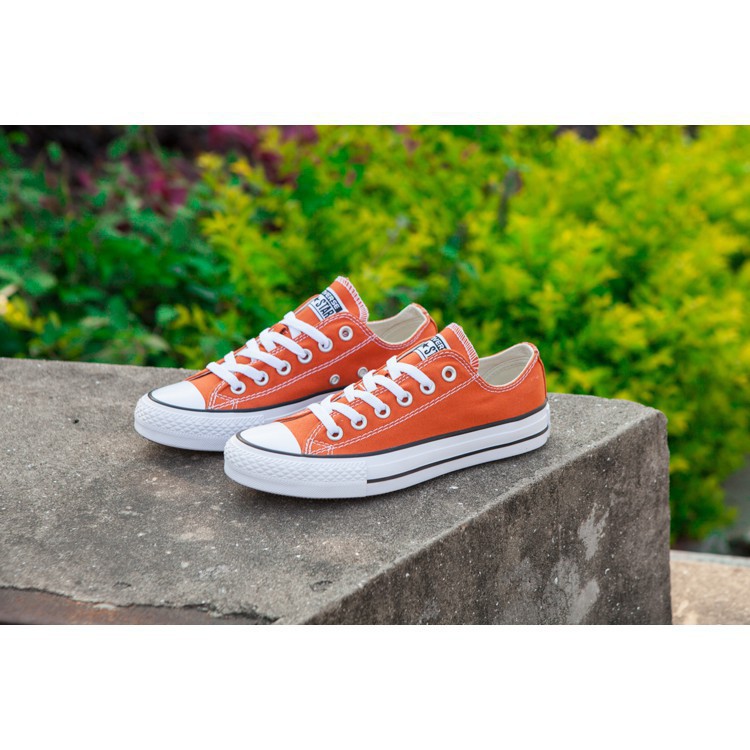 orange color sneakers