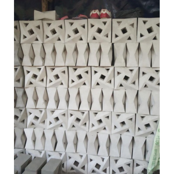 ROSTER BETON MINIMALIS PUTIH 2 MUKA MOTIF KINCIR