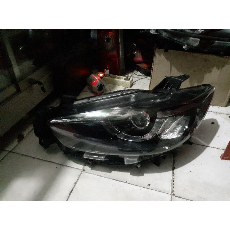 Headlamp Mazda CX 5 2016 lensa satu kiri