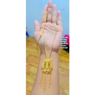 kalung ,cincin motif pintu Aceh (kalung+liontin) dan bisa jadi Bros cantik,awet,mewah