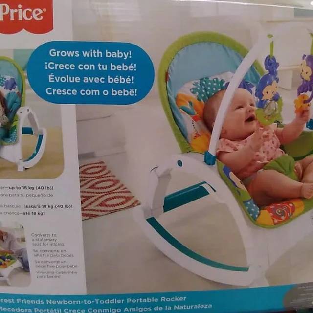 baby sleeping in fisher price rocker