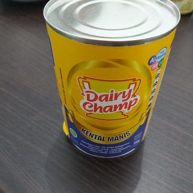 

susu kental manis dairy champ kemasan 500 gr kaleng dan 1kg kemasan pouch