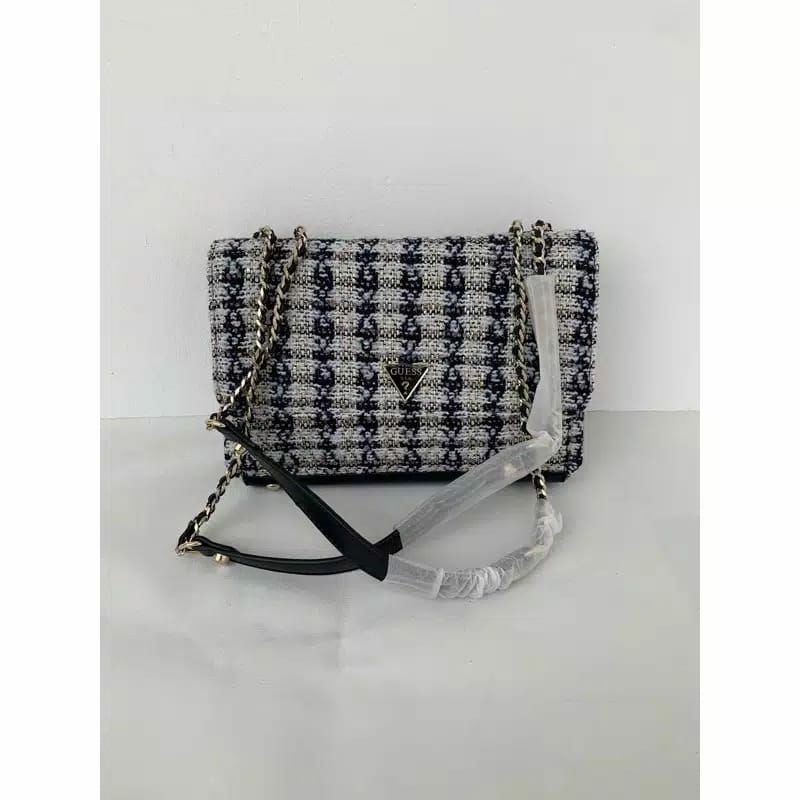 tas guess casely rajut abu