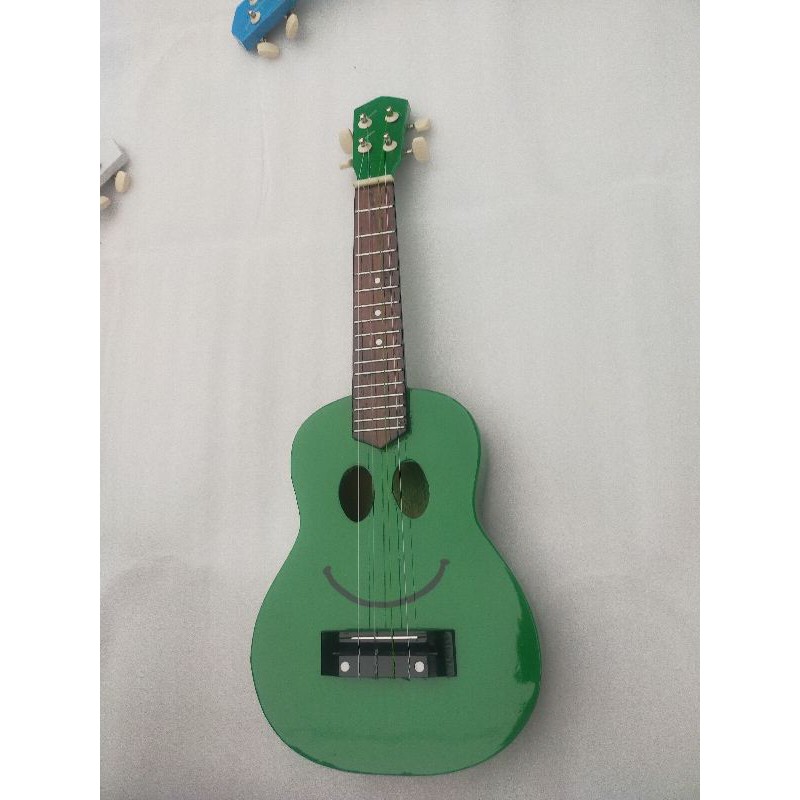 ukulele asli dari kayu bonus pick