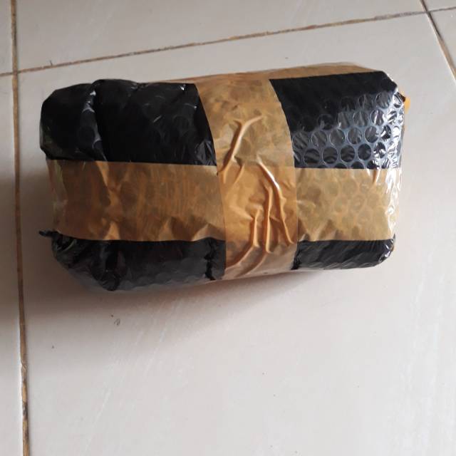 

PACKING TAMBAHAN PLASTIK BUBBLE UNTUK PAKET KECIL