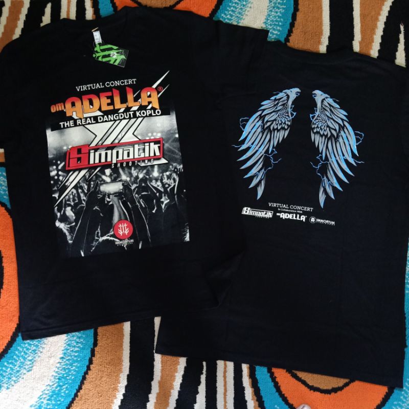 Kaos Adella Simpatik Shooting AMC Terbaru Kaos Distro Pria Original Premium