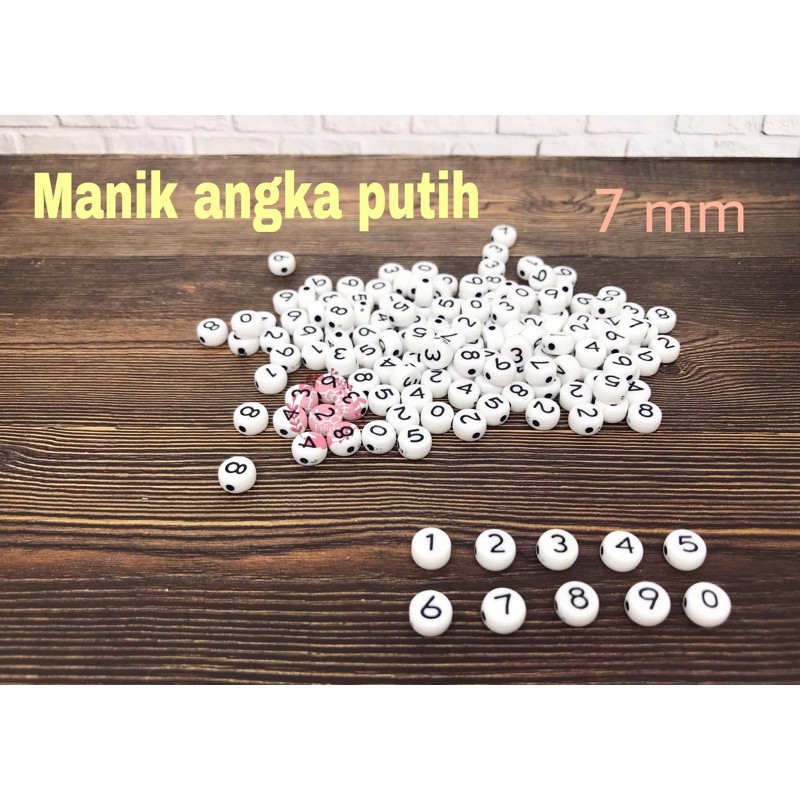 20gr [+/-160pc]. Manik mote angka hitam putih