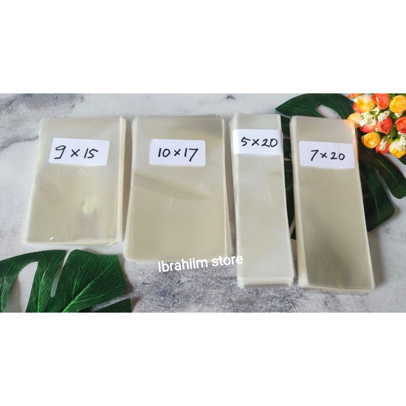 (100gr) PLASTIK OPP TEBAL TANPA LEM PANJANG 10 CM PLASTIK KONEKTOR MASKER / PLASTIK ACCESORIES PLASTIK SOUVENIR