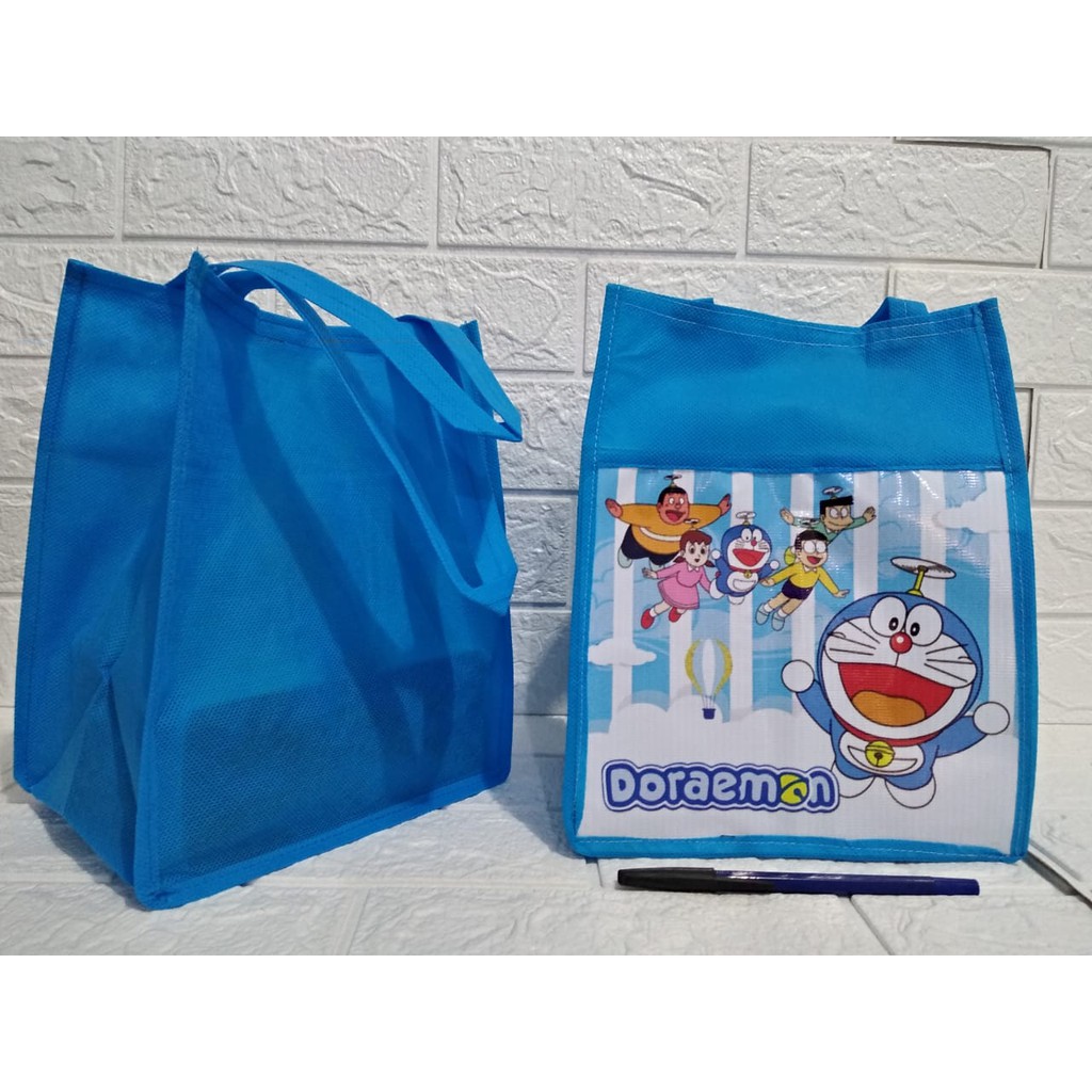  TAS  SPUNBOND NK DORAEMON  Goodie bag Ulang Tahun Anak 