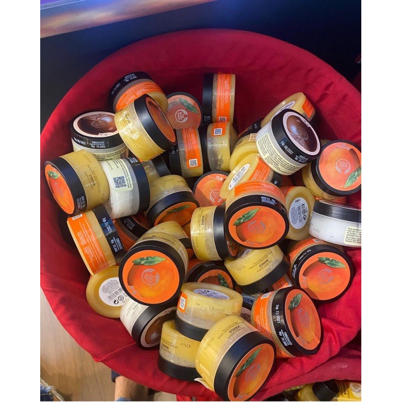 warehouse the body shop exfoliating sugar body scrub mango