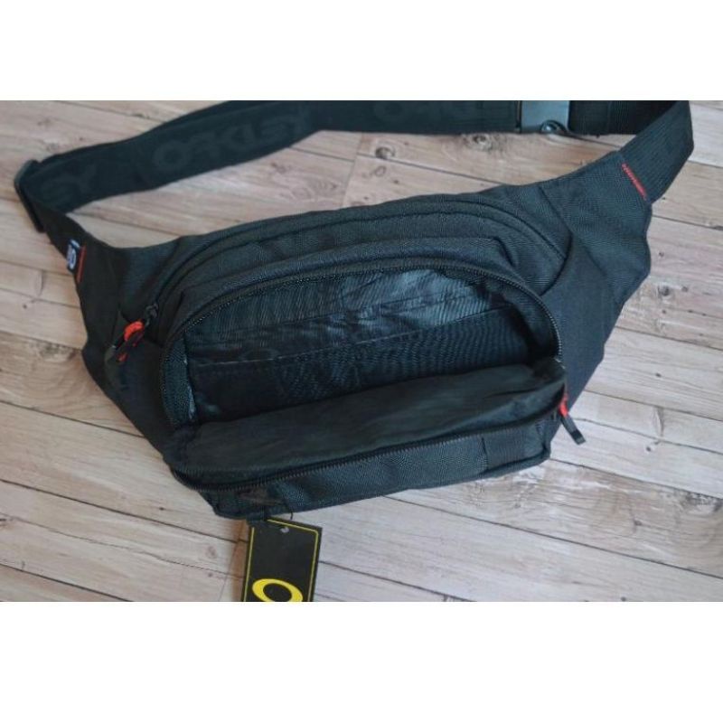 TAS OAKLEYY WAISTBAG OAKLEYY LOGO BESI TAS SELEMPANG OAKLEYY