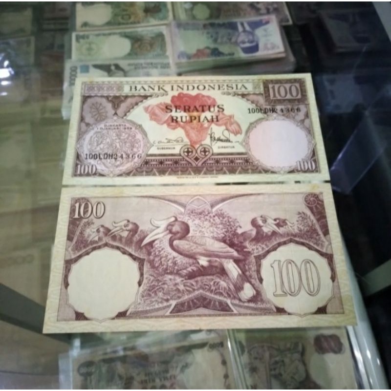 uang kuno 100 bunga bangkai 1959 asli