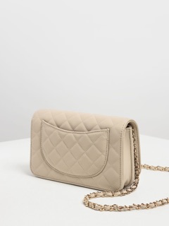 Cross body bag small warna beige  charles and keith 