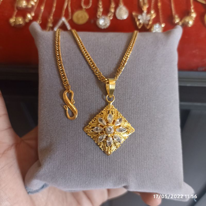 kalung titanium liontin alpaka ukiran bali lapis emas