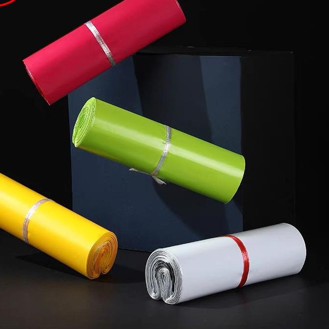 

ⅎ Plastik Packing Baju / Polymailer Olshop LDPE 30X40CM Glossy Isi 100Pcs Lem Perekat Grosir ➼